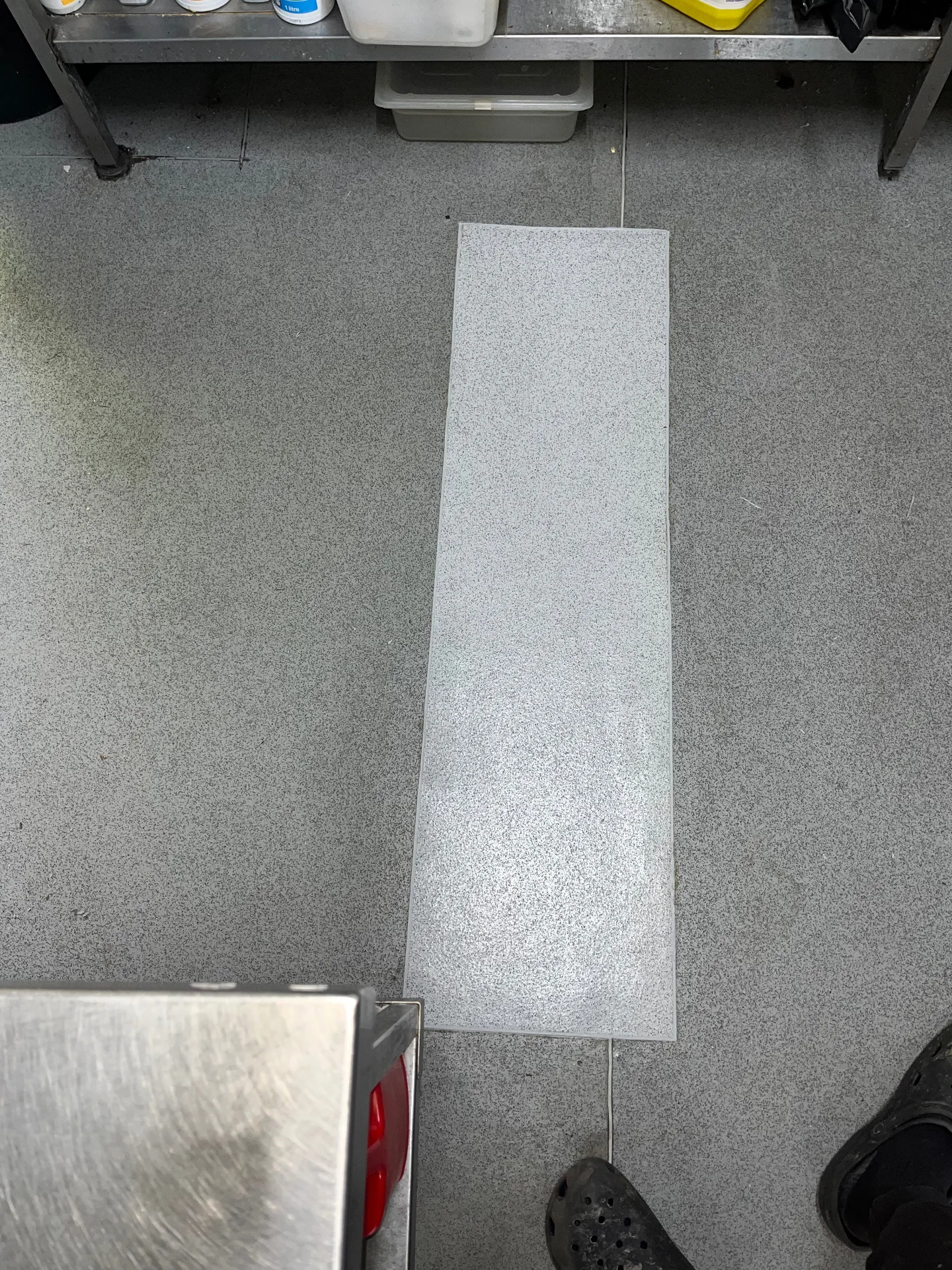 After, commercial kitchen sub-floor and safety vinyl plank repair