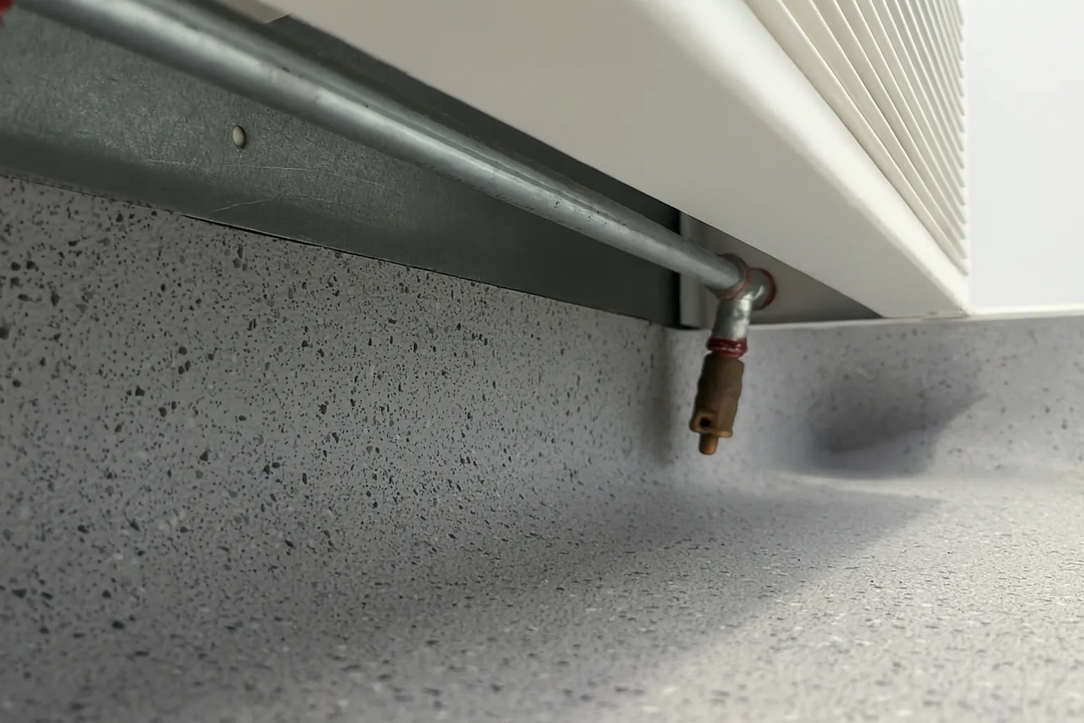 Separated seams in high-traffic sports hallway, invisibly re-welded.