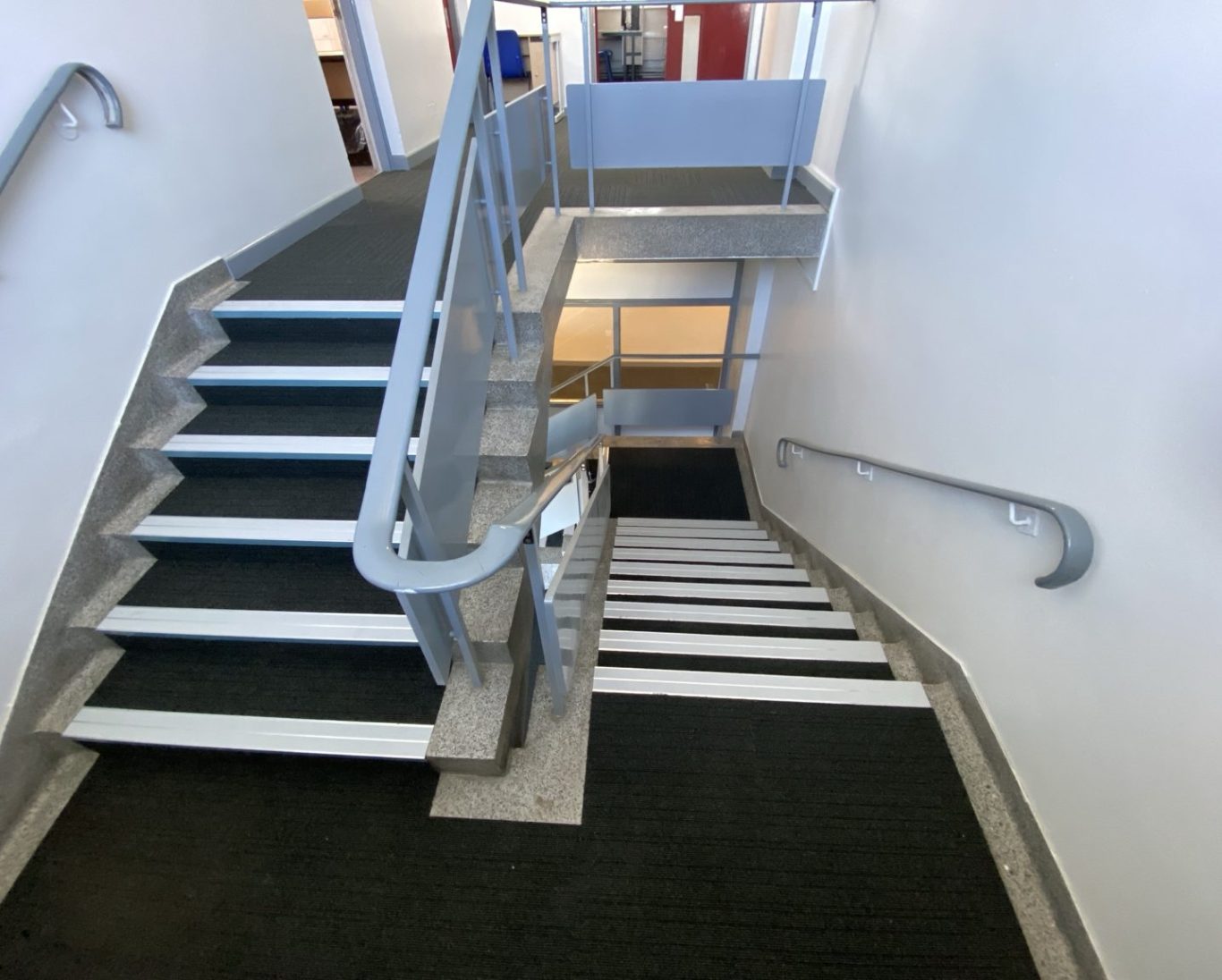 Commercial Stair & Landing Carpet Tile Installation Commercial carpet tile flooring installation to stairs, landings and circulation areas featuring safety nosing' for schools