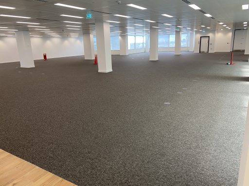 Open Plan Office Carpet Installation Large scale commercial carpet tile installation completed within an open plan office fit-out project.