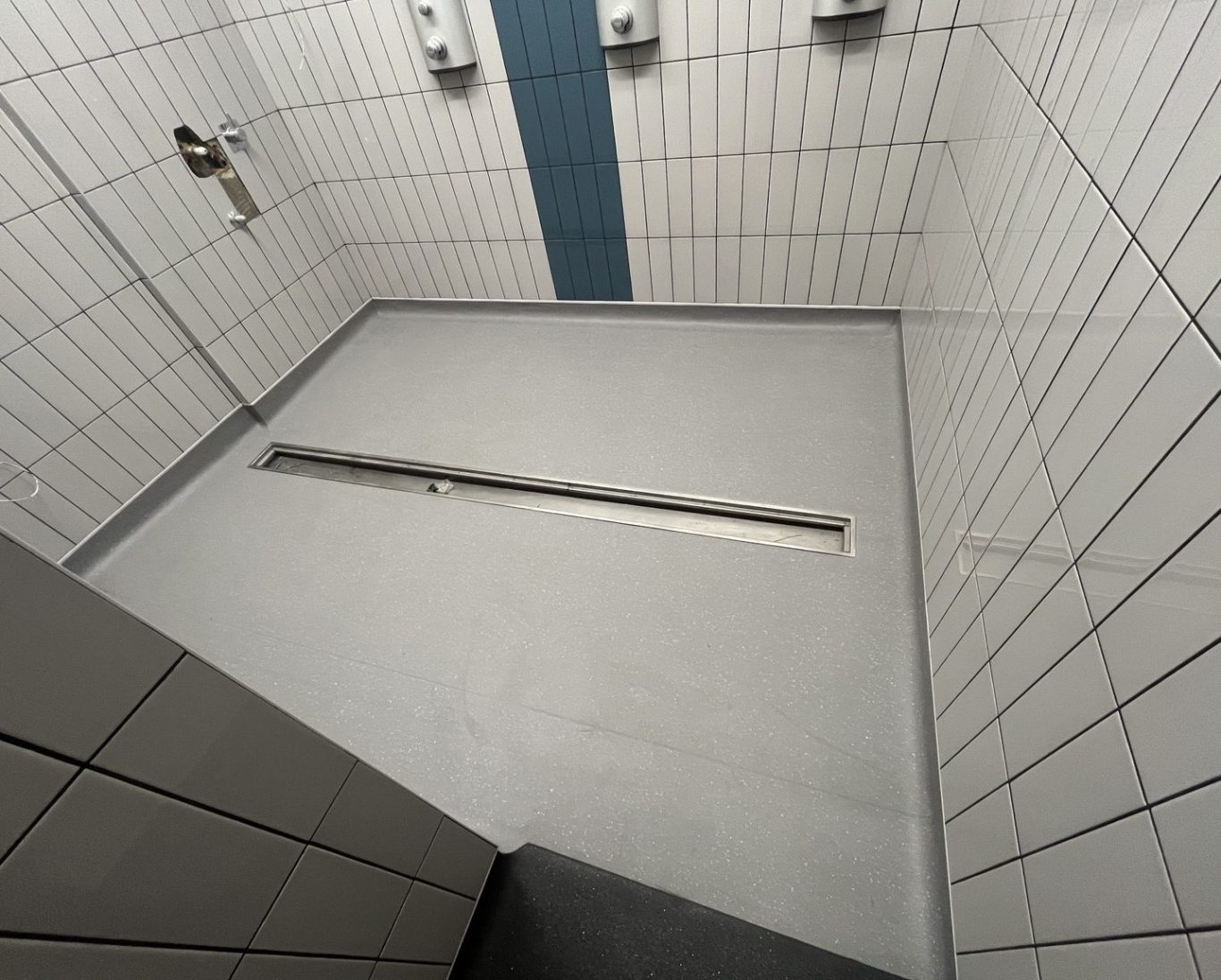 Commercial Wet Room Installation Southampton Commercial wet room installation with linear drainage and safety vinyl